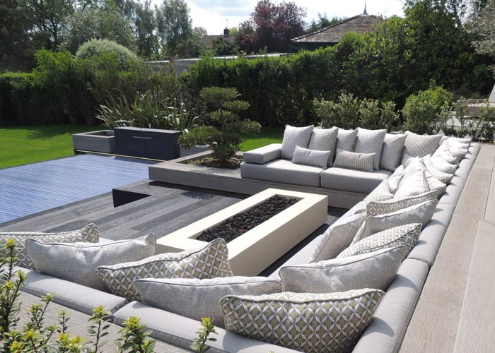 Outdoor seat ushions and scatter cushions in complimentary plain and geometric patterned fabrics