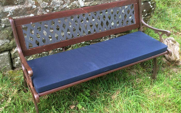 A bespoke outdoor cushion for a garden seat