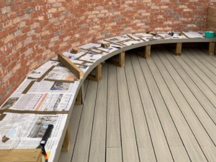 Using newspaper to make templates for outdoor cushions is an ideal solution to ensure accuracy whan fitting.